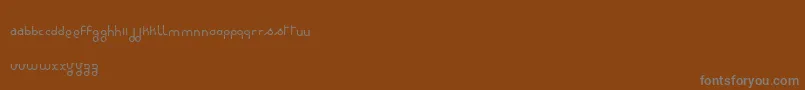 Czcionka RondieDker – szare czcionki na brązowym tle