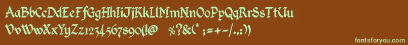 フォントKingthingsCalligraphica – 緑色の文字が茶色の背景にあります。