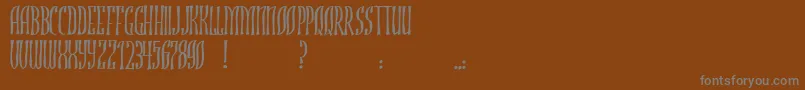 JmhRojo Font – Gray Fonts on Brown Background
