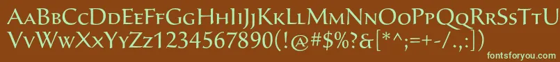 フォントSavaproRegular – 緑色の文字が茶色の背景にあります。