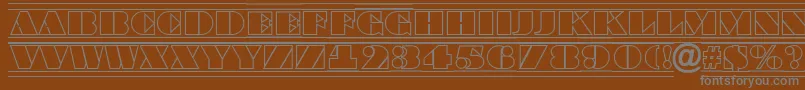 フォントABraggatitulotldcfr – 茶色の背景に灰色の文字