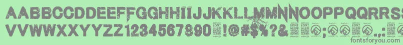 フォントMenofnihilistRegular – 緑の背景に灰色の文字