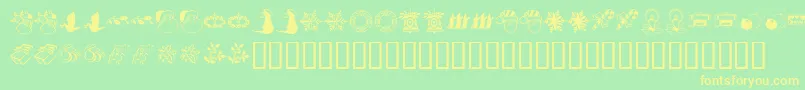 KrChristmasDingsTwo Font – Yellow Fonts on Green Background
