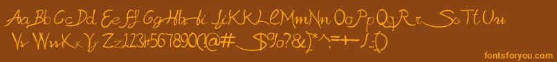 SabrinaAt Font – Orange Fonts on Brown Background