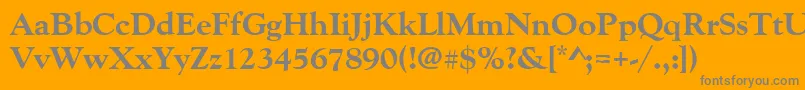 Goudyoldstyteeextbol-fontti – harmaat kirjasimet oranssilla taustalla