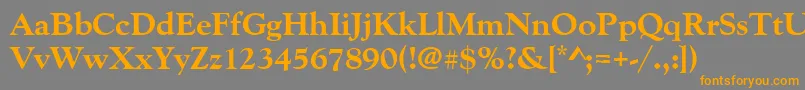 フォントGoudyoldstyteeextbol – オレンジの文字は灰色の背景にあります。