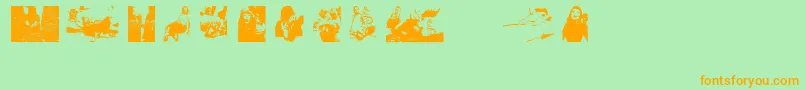 DirtyFemaleFeet-Schriftart – Orangefarbene Schriften auf grünem Hintergrund