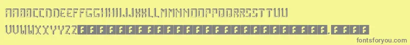 ArcadeBoxes-fontti – harmaat kirjasimet keltaisella taustalla