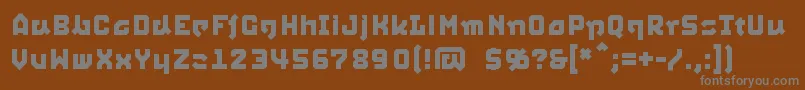 Squid-fontti – harmaat kirjasimet ruskealla taustalla