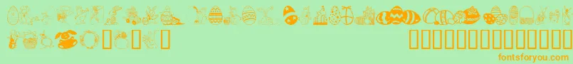 フォントEasterArt – オレンジの文字が緑の背景にあります。