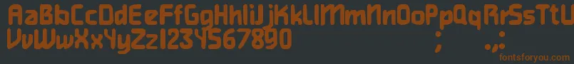 Gamer-fontti – ruskeat fontit mustalla taustalla