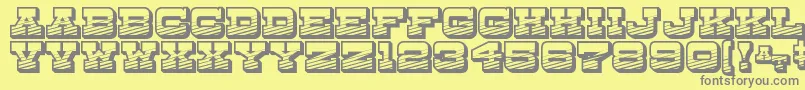 DryGoodsEmporiumJl-Schriftart – Graue Schriften auf gelbem Hintergrund
