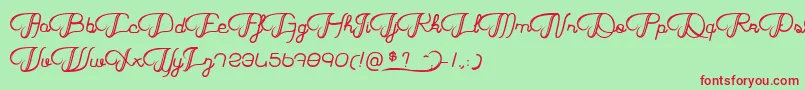 HaricotMagique Font – Red Fonts on Green Background