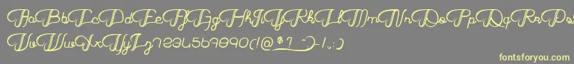 HaricotMagique Font – Yellow Fonts on Gray Background