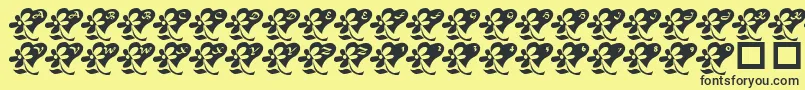 LcrFlowersFromMyHeart Font – Black Fonts on Yellow Background