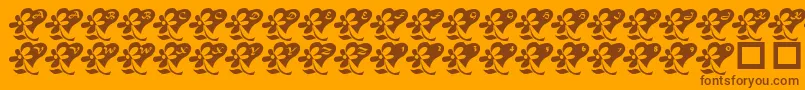 LcrFlowersFromMyHeart Font – Brown Fonts on Orange Background