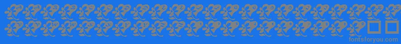 LcrFlowersFromMyHeart Font – Gray Fonts on Blue Background