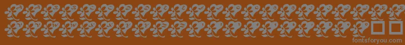Подробнее о шрифте LcrFlowersFromMyHeart Шрифт LcrFlowersFromMyHeart – серые шрифты на коричневом фоне