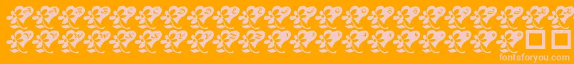 LcrFlowersFromMyHeart-fontti – vaaleanpunaiset fontit oranssilla taustalla