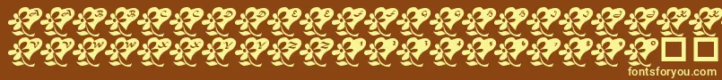 LcrFlowersFromMyHeart Font – Yellow Fonts on Brown Background