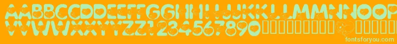 LmsCliffordTheBigRedFont-fontti – vihreät fontit oranssilla taustalla