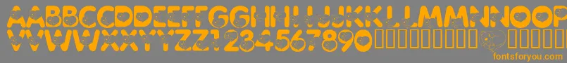 フォントLmsCliffordTheBigRedFont – オレンジの文字は灰色の背景にあります。