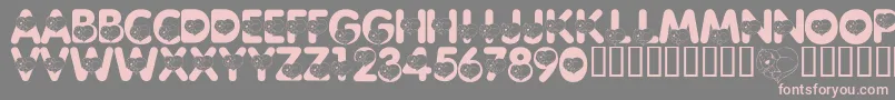 LmsCliffordTheBigRedFont-fontti – vaaleanpunaiset fontit harmaalla taustalla