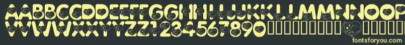 Fonte LmsCliffordTheBigRedFont – fontes amarelas em um fundo preto