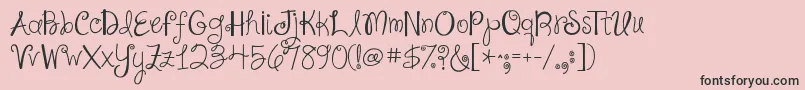 フォントJandashineyourlightonus – ピンクの背景に黒い文字