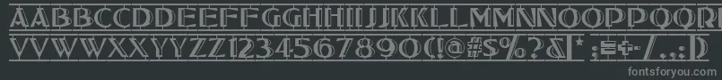 フォントTucson – 黒い背景に灰色の文字