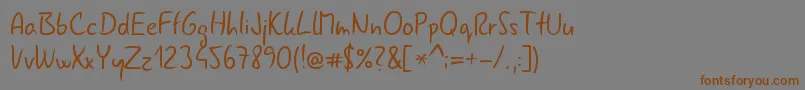 フォントGnyrwn971 – 茶色の文字が灰色の背景にあります。
