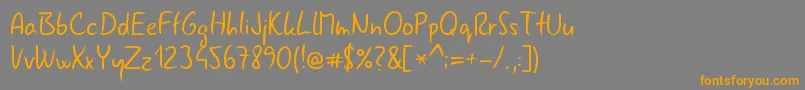 Gnyrwn971-Schriftart – Orangefarbene Schriften auf grauem Hintergrund