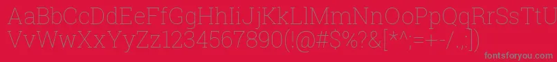 Robotoslab Thin-Schriftart – Graue Schriften auf rotem Hintergrund