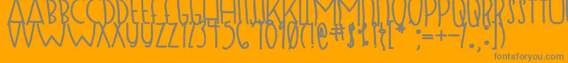 DjbSugarShockMax-Schriftart – Graue Schriften auf orangefarbenem Hintergrund