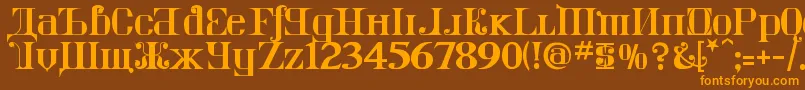 フォントKremlinImperial – オレンジ色の文字が茶色の背景にあります。