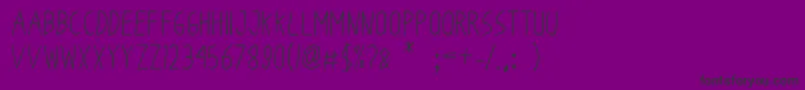 フォントOdumOdum – 紫の背景に黒い文字