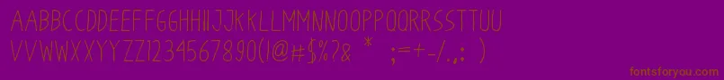 フォントOdumOdum – 紫色の背景に茶色のフォント