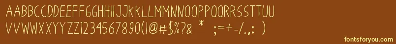 OdumOdum Font – Yellow Fonts on Brown Background