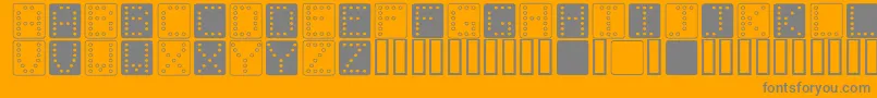 DominoSquare-fontti – harmaat kirjasimet oranssilla taustalla
