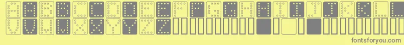 Fonte DominoSquare – fontes cinzas em um fundo amarelo