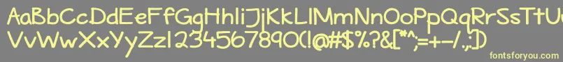 MaritimeTropicalBold-Schriftart – Gelbe Schriften auf grauem Hintergrund
