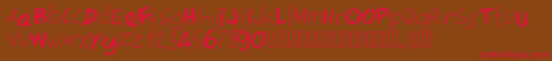 Pwirregular-Schriftart – Rote Schriften auf braunem Hintergrund