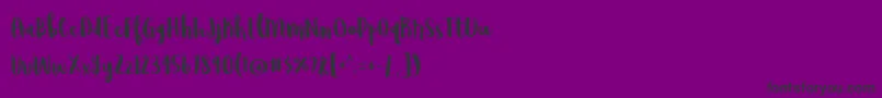 フォントWildemountDemo – 紫の背景に黒い文字