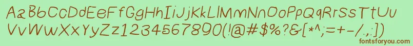 Шрифт Numbbunnywideita – коричневые шрифты на зелёном фоне