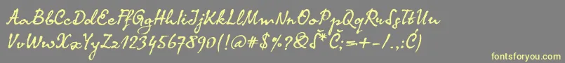 Komalatin-Schriftart – Gelbe Schriften auf grauem Hintergrund