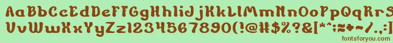 ChildrenStoriesBold-fontti – ruskeat fontit vihreällä taustalla