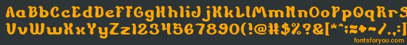 フォントChildrenStoriesBold – 黒い背景にオレンジの文字