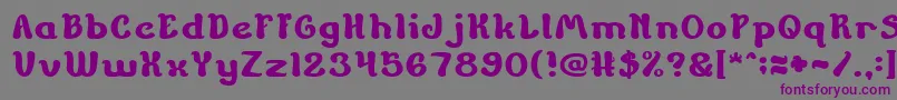 フォントChildrenStoriesBold – 紫色のフォント、灰色の背景