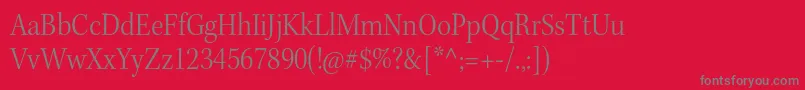 KeplerstdLightscnsubh-Schriftart – Graue Schriften auf rotem Hintergrund