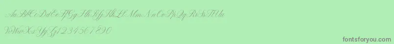 フォントClaudyaDemo – 緑の背景に灰色の文字